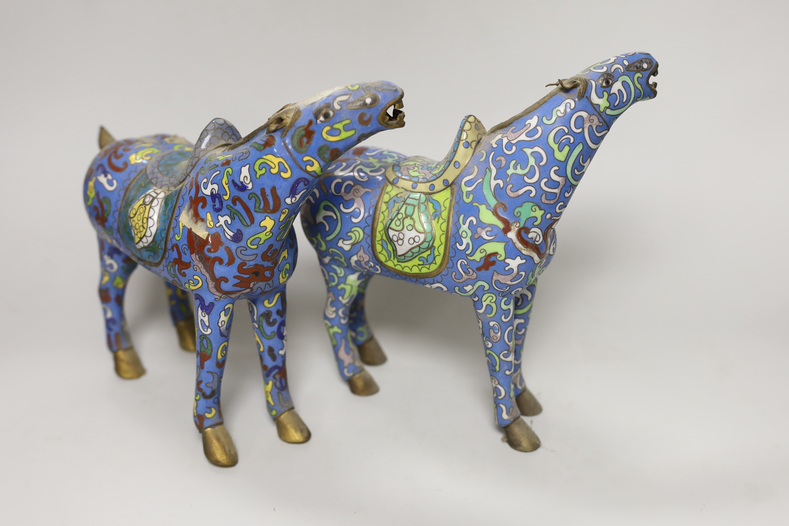 A pair of 20th century Chinese export cloisonné enamel horses, 21cm high